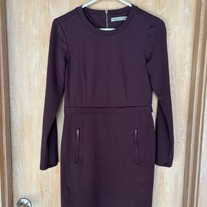 Comfortable yet stylish Athleta dress. Nice detailing gives it a polished look.